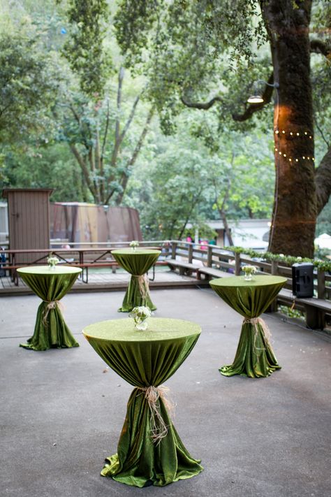 REAL WEDDING PHOTO: green nature inspired cocktail tables Barrel Tables, Cocktail Table Decor, Green Tablescape, Cocktail Party Decor, Cocktail Party Themes, Cocktail Decoration, Green Event, Green Tablecloth, Green Bar