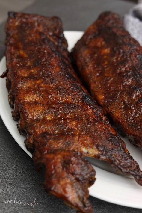 For all the barbecue lovers out there, this recipe for Baby back ribs or Costillas de Puerco is a must-try! Made Paraguayan style with an American touch, these ribs are sure to be a hit at your next cookout. For this Baby baby ribs recipe, you'll need two racks of Costillas de Puerco "baby back ribs," Pink Himalayan or kosher salt, lemon juice, lemon zest, and ground black pepper, which gives these ribs a kick of #Barbecue #Pork Baby Ribs Recipe, Coca Cola Ribs, Babyback Ribs Recipe, Russian Potato Salad, Paleo Barbecue Sauce, Sweet Baby Ray, Spicy Seasoning, Homemade Bbq, Baby Back Ribs