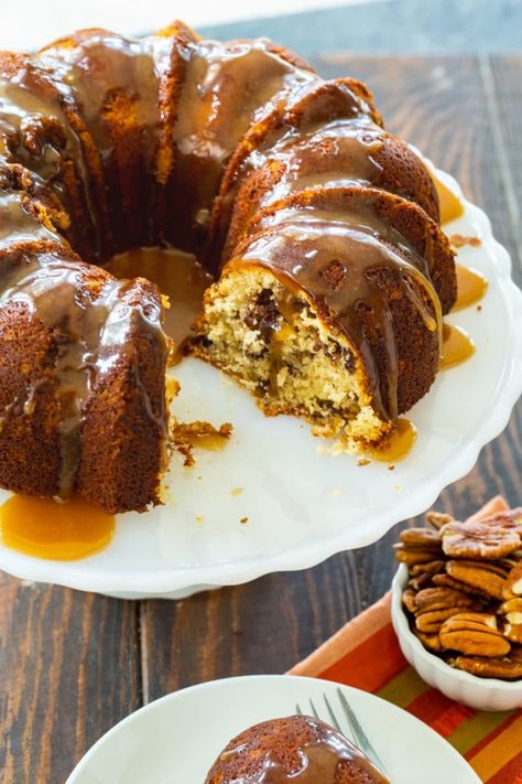 Pecan Pie Bundt Cake with brown sugar glaze. Pecan Pie Bundt Cake, Pecan Bundt Cake, Almond Banana Bread, Gluten Free Banana Cake, Spicy Southern Kitchen, Vegetarian Bake, Brown Sugar Glaze, Apple Spice, Southern Kitchen