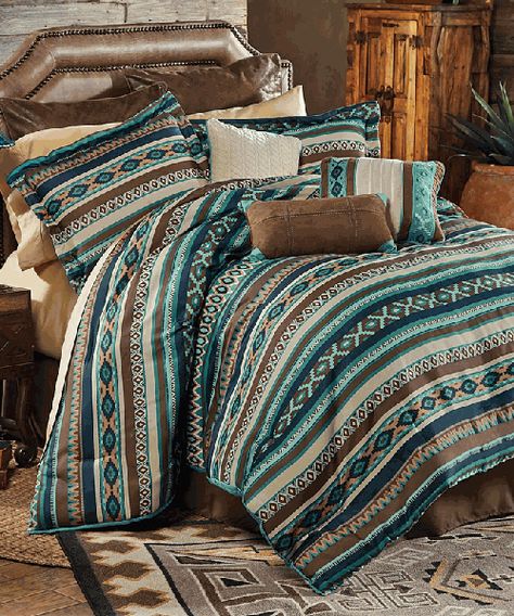 Turquoise Southwestern Bedding The Turquoise Southwestern Bedding Collection combines bold southwestern stripes with beautiful textures. A gorgeous array of colors that uses a subtle blend of turquoise, navy, brown, beige and rust to add dimension. These rich, warm and inviting hues work well to infuse a bedroom with a traditional southwestern feel. The Turquoise Southwestern Bedding Southwestern Bedding, Western Bedding Sets, Rustic Bedding Sets, Western Bedroom Decor, Western Bedding, Rustic Bedding, King Comforter Sets, Luxury Bedding Sets, King Bedding Sets