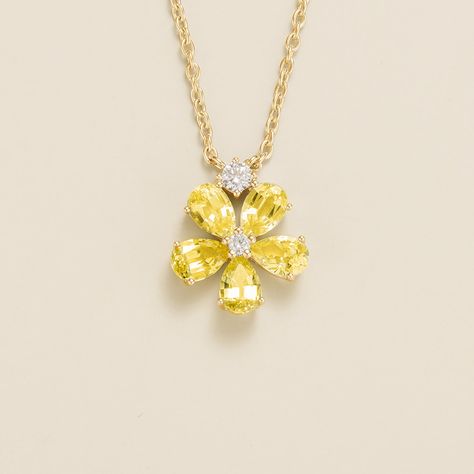 Florea necklace in 18K gold vermeil set with Yellow sapphires and Diamonds. Yellow sapphire: ~2. 5 carats (5 of 6mm x 4mm pear) Diamond VS+ grade: ~0. 15 carats (3mm and 2mm round) Pendant dimensions: 15. 6mm height x 13. 4mm width x 3. 7mm depth Flower of happiness blooms from within. Options available in 9K, 14K and 18K gold, please contact Juvetti. Our precious jewellery is designed to preserve its original brilliance over time. There are a few precautions to make sure to keep your jewellery Yellow Diamond Necklace, June Birthstone Jewelry, Diamond Necklaces, Red Diamond, Conscious Consumer, Green Diamond, Pearl Jewellery Earrings, Champagne Diamond, Evil Eye Jewelry