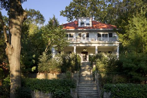 A 1906 American Foursquare with  new landscaping, bluestone walks, new wooden porch columns and rails, new interior beams and trim, a new fireplace mantel and tile surround, a new dining-room buffet and picture window, and a 1930's-style kitchen suggesting an earlier renovation. Wooden Porch Columns, American Foursquare House, Foursquare House, Four Square Homes, Square House Plans, American Foursquare, Square House, Luxury Beach House, Stucco Homes