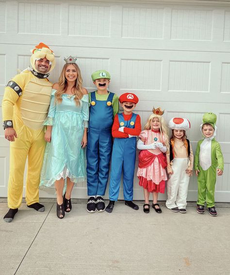 Dare to scare with our top scary family Halloween costumes ideas for 2024! Perfect for families who love a good fright, including those with babies and toddlers. Make your Halloween party the spookiest one yet! #ScaryCostumes #Halloween2024 #FamilyFun #halloween #halloweencostumes - 024951B Family Nintendo Costumes, Mario Brothers Family Halloween Costumes, Family Of 5 Halloween Costumes Mario, Mario Party Character Costumes, Super Mario Brothers Halloween Costumes, Mario And Friends Costumes, Super Mario Bros Halloween Costumes Family, Mario Kart Family Halloween Costumes, Diy Mario Family Costumes