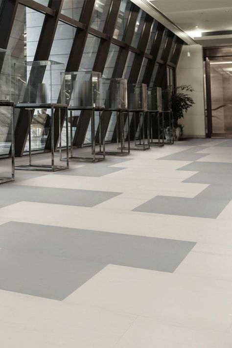 With subtle color variations and more random patterning, this large-scale, free-flowing aesthetic lends an open, organic feel and updated appearance to any space—plus all the strength and comfort of traditional rubber flooring. While rubber is often reserved as a safe and comfortable solution for education and healthcare spaces, this stylish design is ready to greet guests and customers in the front of the house, from lobbies to conference rooms. Vct Flooring Pattern, Flowing Aesthetic, Vct Flooring, Interior Columns, Rubber Tiles, Therapy Dog, Conference Rooms, Linoleum Flooring, Commercial Flooring