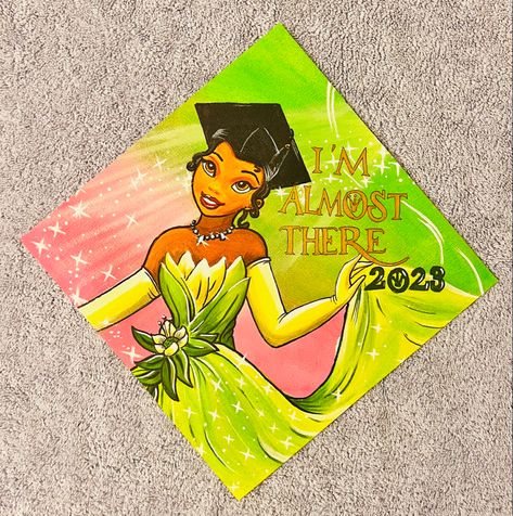 Princess And The Frog Cap Decoration, Princess Tiana Grad Cap, Graduation Cap Designs Green, Tiana Graduation Cap, Princess Tiana Graduation Cap, Princess And The Frog Graduation Cap, Senior Year Diy, Teacher Graduation Cap, Creative Graduation Caps