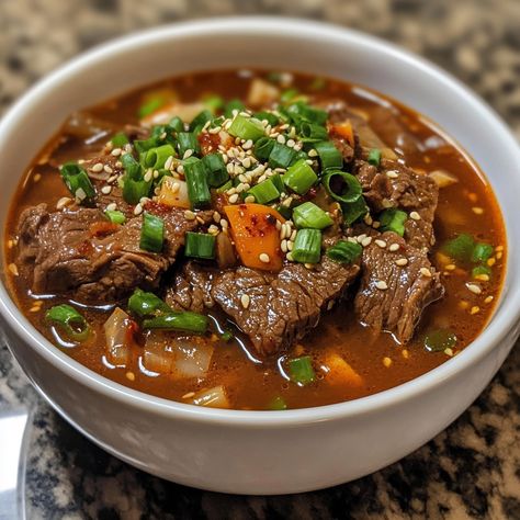 🔥🍲 Dive into Yukgaejang—a spicy, savory Korean beef soup that's perfect for warming up on a chilly day! 🌶️🍜 #Yukgaejang #SpicySoup Yukgaejang (Spicy Beef Soup) Ingredients: Beef brisket (1 lb, thinly sliced) Korean chili flakes (2 tbsp) Soy sauce (3 tbsp) Garlic (4 cloves, minced) Ginger (1 inch, minced) Onion (1, chopped) Green onions (2, chopped) Bean sprouts (1 cup) Korean radish (1 cup, sliced) Water (6 cups) Salt (to taste) Pepper (to taste) Instructions: Boil beef brisket in water f... Brisket Soup, Korean Beef Soup, Spicy Beef Soup, Korean Radish, Korean Chili Flakes, Korean Chili, Boiled Beef, Soup Ingredients, Instagram Recipes