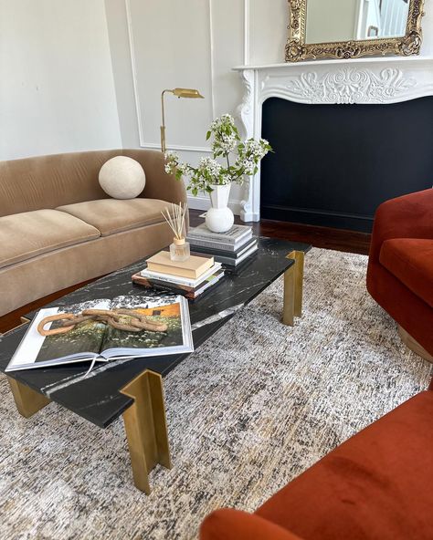 Styling this black marble coffee table has been so fun. Also, did I mention I scored this table for $150 on Facebook Marketplace? Yes, it’s real marble! On another note, I hope you are enjoying this beautiful spring weather in the northeast. It’s truly bliss. 💕 #marblecoffeetable #cb2interiors #springhomedecor #muircamelsofa #adstyle #archdigest Black Marble Coffee Table, Arch Digest, My Score, Co Design, Marble Coffee Table, Spring Home Decor, Black Marble, Marble, Coffee Table