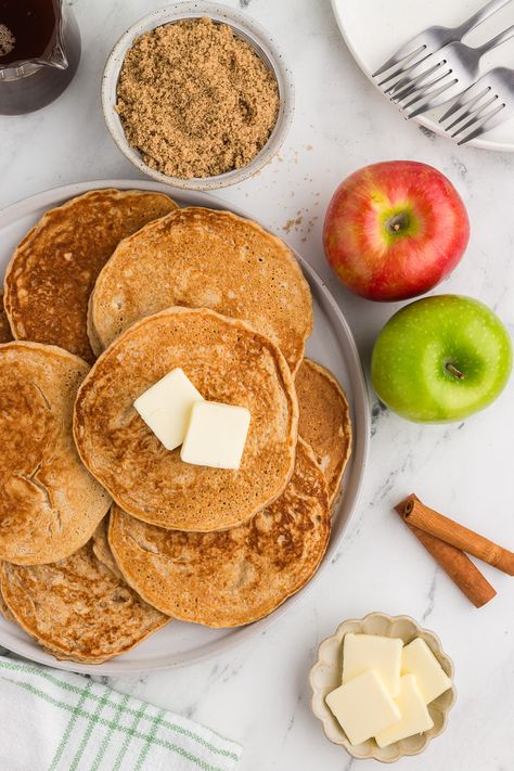 These easy applesauce pancakes with cinnamon, nutmeg, and vanilla make the PERFECT fall breakfast! Moist and tender yet fluffy with subtle apple flavor, these applesauce pancakes are so delicious, especially with homemade apple cider syrup or sautéed apples on top. Applesauce Pancakes Easy, Applesauce Pancakes No Eggs, Apple Cinnamon Pancakes Easy, Apple Sauce Pancakes For Baby, Pancakes Apple Cinnamon, Applesauce Pancakes, Apple Cider Syrup, Cinnamon Pancakes, Homemade Apple Cider