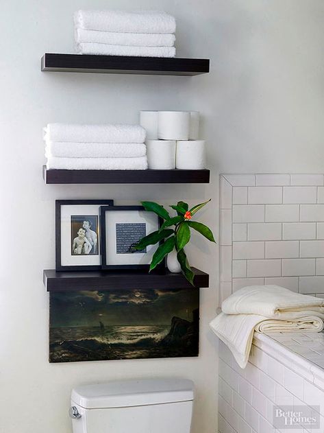 Bathroom Storage Solution: Stack a trio of clean-lined shelves on the wall above the toilet to cleanly store items. Bathroom Towel Storage Ideas, Float Shelf, Above Toilet, Shelves Above Toilet, Bathroom Towel Storage, Shelves Over Toilet, Ideas Baños, Interior Design Per La Casa, Small House Interior Design