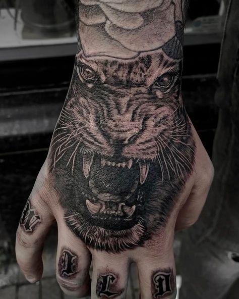 Wow! Amazing tiger hand tattoo by @tattoos.by.aireen with #tattoolandsupplies 🆙🆙🆙Thanks for sharing! #tattooland #tattoolandsupplies #artistwork #tattooartist #tattoo #handtattoo #handtattoos #blackandgreyink #inked Black And Grey Tiger Tattoo, Three Tattoo, Tiger Hand Tattoo, Tattoo Equipment, Tiger Tattoo, Family Tattoos, Realism Tattoo, Hand Tattoo, Tattoo Placement