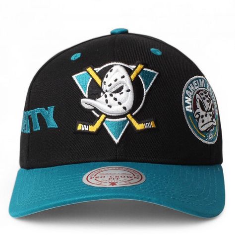 Show your love for your team with all your casual outfits by adding this accessory piece. The men's NHL Anaheim Ducks Pro Crown Snapback features the iconic Ducks logo embroidered front and center in the bold Anaheim Ducks team colors. This piece will add the perfect pop of color to all your outfits. Anaheim Ducks Logo, Duck Logo, Anaheim Ducks, Mitchell & Ness, Anaheim, Team Colors, Logo Embroidered, Ducks, Nhl