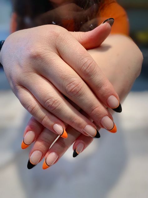 Halloween Orange French Tip Nails, Nail Ideas Orange And Black, Black Orange French Tip Nails, Black And Orange Nails French Tip, Orange Tip Halloween Nails, Black And Orange Tip Nails, Black And Orange French Tip Nails Halloween, Black Nails With Orange Design, Halloween Nail Tips French Manicures