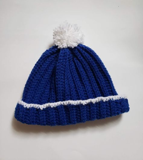 Handmade crochet hat, royal blue and white. Acrylic yarn. School colors, blue and white. Handmade white yarn pompom with white trim. Label affixed inside, can be worn cuffed or uncuffed. Crocheted Hat, Bonnet Crochet, Blue Crochet, Skull Cap Beanie, School Colors, Crochet Hat, White Acrylic, White Trim, Skull Cap