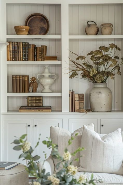 15 Bookshelf Decor Ideas That Will Make You Look Like a Styling Genius Fall Bookcase Decor Ideas, Styling Shelves Living Room, Bookcase Styling Living Room, Farmhouse Bookshelf Decor, Decorating Built Ins, Built In Shelf Decor, Styling Built In Shelves, Bookshelf Styling Living Room, Bookshelf Decor Ideas