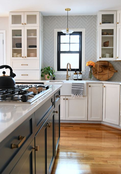 25 Kitchen Tile Ideas You'll Love Grey Herringbone Backsplash, Board Ideas For School, Bulletin Board Ideas For School, Herringbone Kitchen Backsplash, Herringbone Kitchen, Glass Cabinets, Herringbone Backsplash, Fireclay Tile, Backsplash Kitchen