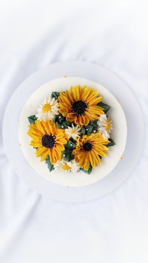 Ending this week with some sunflowers and daisies! One of my all time favorites and I do "fall in love with it a little bit more" every time I see it! 🥰😍 . . . . . . . . . #cakereels #buttercreamflowers #flowerpiping #pipingflowers #pipingskills #floralcake #flowercake #cakevideos #caketutorials #reelsindia #reelcake #cakereelsofinstagram #buttercreamflower #buttercreamflowercake #snfcakes #cakevideo #cakevideosdaily #buttercream #buttercreamflower #buttercreamart #cakeartistindia #indi Sunflower Birthday Cakes, Sunflower Cake, Sunflower Birthday, Floral Cakes, Piping Flowers, Buttercream Flower Cake, Sunflowers And Daisies, Cream Art, Incredible Edibles