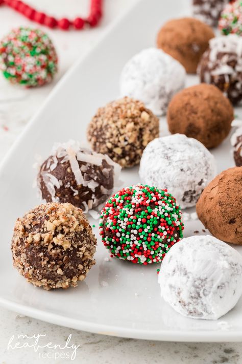 Christmas Rum Balls Recipe Christmas Snack Aesthetic, Idle Isle Nut Balls Recipe, Rum Balls Christmas, How To Make Rum Balls, Amaretto Balls Recipe, Christmas Balls Cookies, Rum Balls With Graham Crackers, Christmas Booze Balls, Dessert Balls No Bake