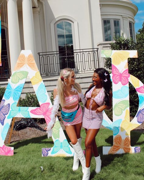 Flower Sorority Letters, Aoii Paintings, Aoii Letters, Phi Mu Letters, Sorority Letters Painted, Spirit Week Themes, Painted Butterflies, Recruitment Ideas, Alpha Gam