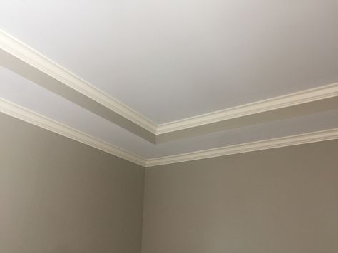 CREAMY CROWN MOLDING INSIDE TRAY CEILING AND PERIMETER OF ROOM, WHITE CEILINGS, ANEW GRAY WALL PAINT White Paint Ideas, Gray Wall Paint, Anew Gray, Gray Painted Walls, Ceiling Trim, Wall White, Gray Wall, Room White, Tray Ceiling