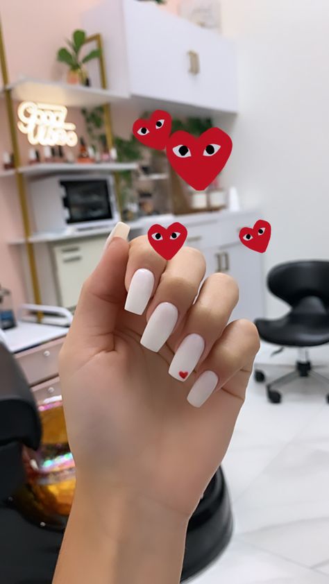 White Nails With Heart With Eyes, Heart In Corner Of Nail, All White Nails With Heart, White Nails With Orange Heart, Nails Acrylic White With Heart, White Square Nails With Heart, White Nails With One Red Heart, White Nails With One Heart, Corner Heart Nails