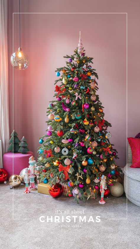 Sparkling Celebration - Bold Colors, Cheerful Figures, and Plenty of Gold

Get ready for a Sparkling Celebration! This trend is perfect for anyone who loves bold and dazzling Christmas decorations. With vibrant colors like fuchsia, turquoise, lime yellow, and soft pink, you can create a festive and joyful atmosphere at home. Bright Coloured Christmas Decorations, Colourful Christmas Tree Decorations, Bright Colorful Christmas Tree, Multi Colored Christmas Tree Decorations, Christmas Tree Colourful, Multi Color Christmas Tree Decorations, Christmas Tree Multi Color Lights Decor, Bright Color Christmas Decor, Colorful Christmas Tree Ideas