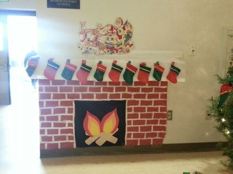 Diy fireplace materials: butcher paper, paint, cardboard and tape... lots of tape! Paper Fireplace, Christmas Classroom Decorations, Paint Cardboard, Jade Egg, Classroom Christmas Decorations, Holiday Fireplace, Work Decor, Education Major, Christmas Teaching