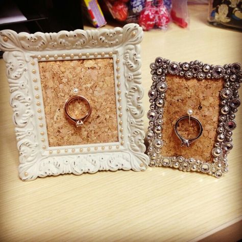 Homemade wedding ring holders! Don't risk losing it down your sink anymore!    Purchase: Cute frames Burlap, 1 Cork-board scrapbook sheet of material, Push pins (I got the ones with fake pearls on end), Then   -Remove glass and fake photo from frame -cut burlap into smaller sizes -cut cork board material slightly larger than back of frame -Insert cork material through photo frame hole -Backfill with desired amount of burlap -Replace back of photo frame. And close -Insert push pin -Hang ring! Wedding Ring Holders, Cork Decor, Framed Burlap, Homemade Wedding, Cork Material, Ring Holders, Ring Holder Wedding, Cute Frames, Cork Crafts