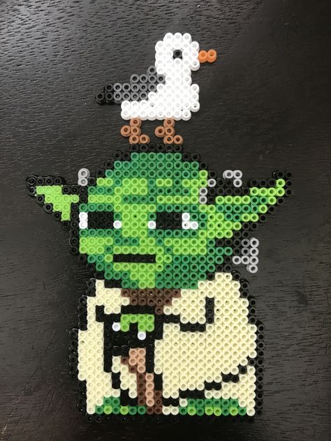 Yoda with seagulls perler pattern Yoda Perler Beads Pattern, Perler Beads Ideas Star Wars, Grogu Perler Bead Pattern, Boba Fett Perler Beads, Darth Maul Perler Beads, Star Wars Perler Bead Patterns Bb-8, Nerdy Perler Beads, Perler Pattern, Fusion Beads