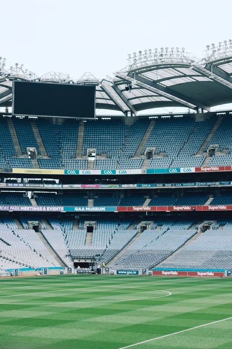 Croke Park is the stadium of Dublin. It’s the home of Gaelic Athletic Association (as you can see on the banners) and Gaelic games. The day I visited it, Prince Harry had been there few hours before and he walked on that grass. It’s something unusual because of the conflicts between UK and Ireland!. Download this photo by Henry Be on Unsplash Piyush Bansal, Football Wallpaper Iphone, Gaelic Football, Picture Wall Bedroom, Croke Park, Images Of Ireland, Football Stadium, Blue Football, Football Stadiums