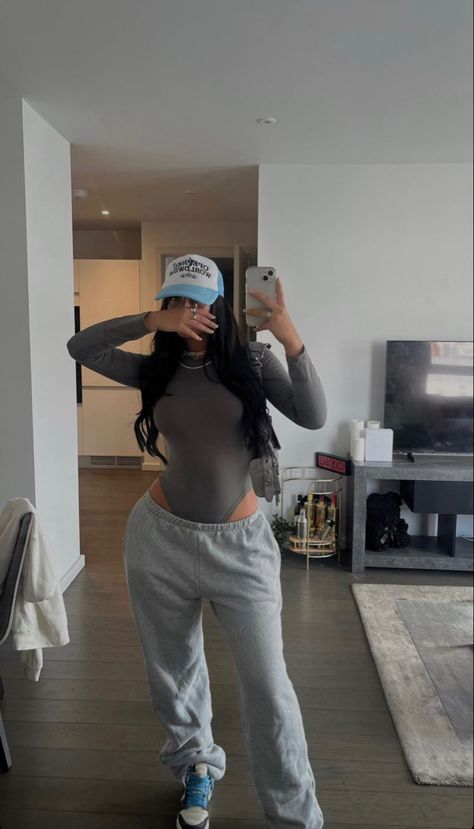 Skims And Sweatpants, Women’s Tracksuit Outfit, Bodysuit And Joggers, Bodysuit With Baggy Jeans, Sweats And Bodysuit Outfit, White Bodysuit Outfit Black Women, Skims Bodysuit Outfit Ideas, Thong And Sweatpants Outfit, Grey Joggers Outfit