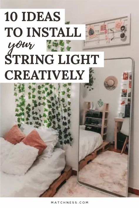 You can use string lights for lighting ideas in your home to make it look more beautiful. Try attaching the vines to the wall, then adding string lights there. So that it will make your walls look beautiful and can be the perfect focal point. #stringlight #lighting #decorativelighting Vine Garland Bedroom, Boho Bedroom With Curtain Lights, Sheer Curtains With String Lights, Vine Wall In Bedroom, Curtain Lights And Vines Bedroom, Curtain Lights With Vines, Curtain Vine Lights, Wall Vine Ideas, Vine Lights Bedroom Ideas