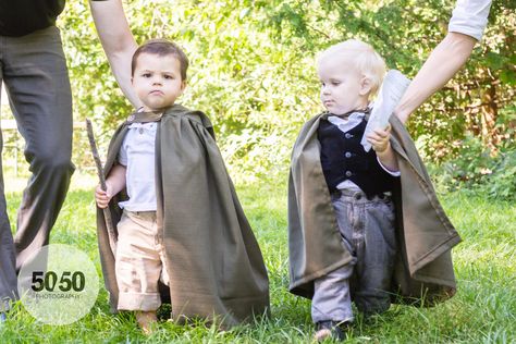 Adorable Hobbits for our Ring bearers. The kids were dressed in most of their own clothes , but had D.I.Y capes made to wear when walking down the aisle. Sticks came from the bushes haha Hobbit Ring Bearer, Hobbit Ring, Archery Costume, Hobbit Wedding, Enchanted Forest Wedding Theme, Lotr Wedding, Diy Cape, Lotr Costume, Nerd Wedding