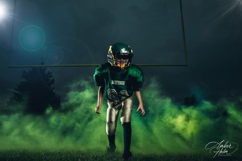 Peewee football player standing ready in a fog of green smoke. Kids Sports Pictures, Girls Playing Football, Peewee Football, Football Senior Pictures, Cool Boys, Sport Portraits, Football Photography, Fall Football, Central Illinois