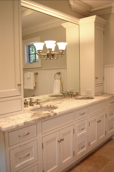 Bathroom Vanity Ideas. Customa Vanity. This is a 7.5 foot vanity, with a basic 60" vanity in between two 15" drawer units on either side, and 15" wide tall upper cabinets for toiletry storage. Faux drawers at bottoms hide electrical boxes. Calcatta gold marble countertops by Rye Marble.  Studio Dearborn. Bathroom Vanity Countertops, Bathroom Vanity Storage, Room Vanity, Fixtures Bathroom, Large Bathroom, Bad Inspiration, Master Bath Remodel, Bathroom Light, Gold Bathroom