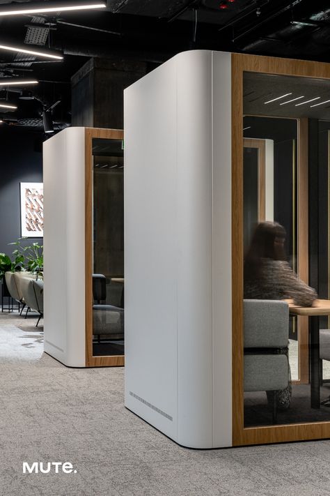 The international law firm created a new marvelous office space on the top floor of the highest building in the EU. We were delighted to make our mark on this one-of-a-kind space using our acoustic pods and sound absorbers. One of the designer’s goals was to provide many places for meetings. Acoustic pods were the natural solution for providing acoustic comfort. All of the office pods were placed close to employee workstations, providing people with a convenient place for quick video calls. Acoustic Panels Office Design, Phone Boot, Office Pods Design, Office Pods Workspaces, Meeting Pods Office, Acoustic Wall Panels Auditorium, Phone Booth Office, International Law, Pod Design