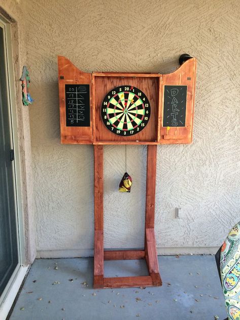 How to build an outdoor dartboard stand | DIY projects for everyone! Dartboard Stand Diy, Outdoor Dartboard, Outdoor Dart Board, Diy Dartboard, Dartboard Cabinet, Dart Board Cabinet, Table Folding, Backyard Games, Dart Board