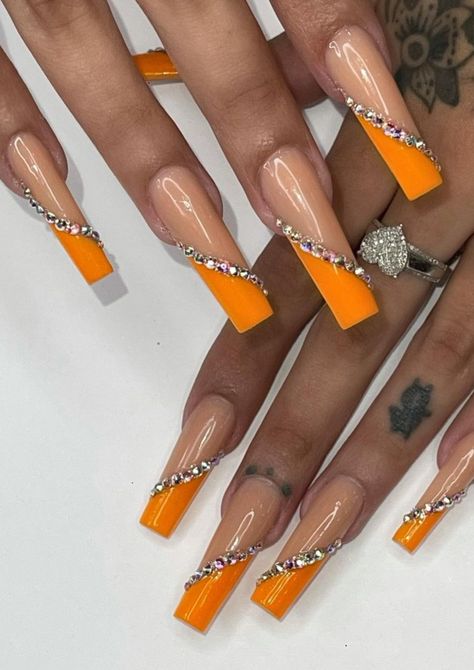 Orange Nails Rhinestones, Orange And Silver Nails Prom, Orange And Silver Nails Acrylic, Orange Acyrilics Nails, Orange Prom Nails Acrylic, Orange Acrylic Nails With Rhinestones, Orange Rhinestone Nails, Orange Nails Prom, White And Orange Nails Acrylic