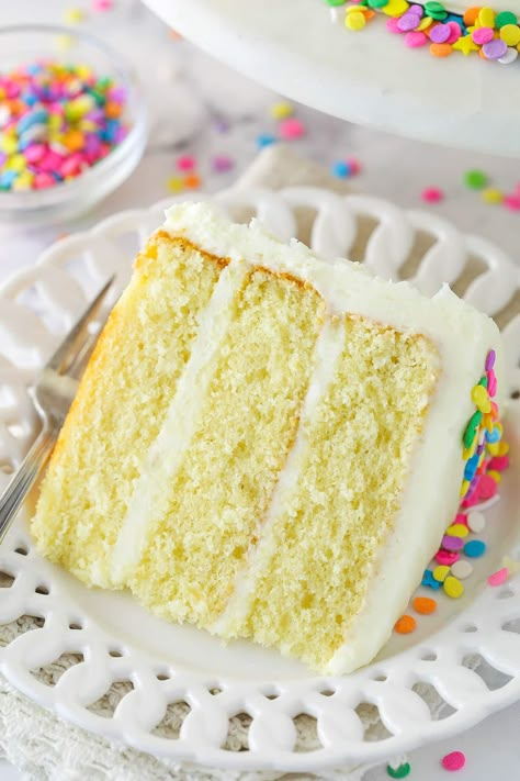 This vanilla layer cake is the one cake that everyone needs to know how to make. Three layers of moist, fluffy vanilla cake are filled and frosted with rich vanilla buttercream. It's wonderfully simple and absolutely heavenly. Fluffy Vanilla Cake Recipe, Vanilla Layer Cake Recipe, Vanilla Layer Cake, Best Vanilla Cake, Fluffy Vanilla Cake, Life Love And Sugar, Cake Recipe Moist, Moist Vanilla Cake, Layer Cake Recipes