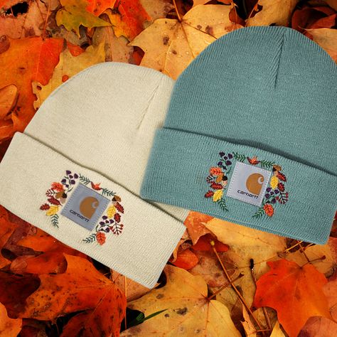 Adult Carhartt Knit Cuffed Beanie beautifully embroidered with colorful fall leaves, acorns, berries and purple flowers. Perfect gift for a special lady. A great look in the cold climate seasons. This Carhartt beanie is fully versatile and can be worn with any style. Constructed from thick acrylic rib-knit yarn, the Adult Carhartt Knit Cuffed Beanie is super soft and incredibly warm on a cold winter day. Plus, the stretchy fabric ensures that this Carhartt beanie stays put all day long. Carhart Beanie, Carhartt Hat, Carhartt Beanie, Toddler Beanie, Diy Sewing Gifts, Mom Hats, Hat Embroidery, Trendy Fall, Cute Embroidery