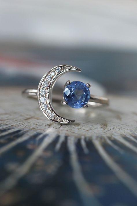 Crescent moon engagement ring with sapphire and diamonds Engagement Ring With Sapphire, Moon Engagement Ring, Leaf Rings, Eden Garden, Handcrafted Engagement Ring, Crescent Moon Ring, Flower Rings, Nature Inspired Wedding, Lucky Jewelry