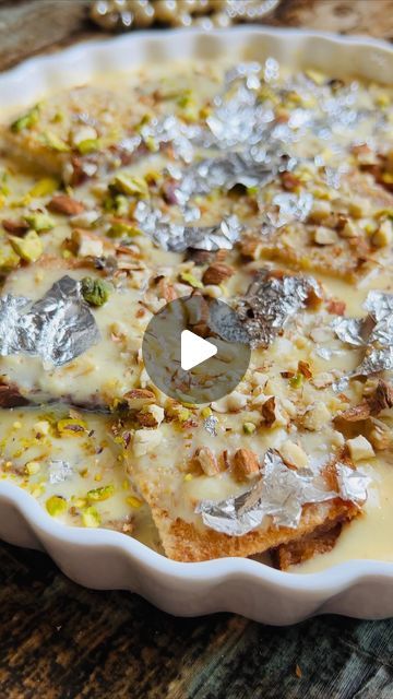 Dr Nadia Aquil | Recipe Developer on Instagram: "Rabdi Shahi Tukda 
Royal bread Dessert 
30 min quick recipe 

Ingredients 

✔️Bread 4 cut into squares 16 square slices 
✔️Ghee 1 cup or oil or butter < ghee is preferred for authentic taste > for deep frying 

🔆In a wok add ghee and fry bread slices until golden Crisp from both sides and set aside 

🔆For Rabdi 

✔️Milk 2 &1/2 cups 
✔️Sugar 1 cup 
✔️Dry milk powder 1 cup @nidoarabia 
✔️Cardamom few pods 
✔️Saffron few strands 
✔️rice flour or corn flour 2 heaped tablespoons dissolved in 1/4 cup of milk @fosterclarksarabia 

Method for rabdi 

✔️In a sauce pan add milk , cardamom, saffron and keep stirring on low to medium flame add sugar and stir for 15 min . 
✔️add corn flour or rice flour mixture slurry and cook until mixture starts to g Shahi Tukda Recipe, Shahi Tukda, Recipe Developer, Cup Of Milk, Fry Bread, Corn Flour, Deep Frying, Sauce Pan, Indian Sweets