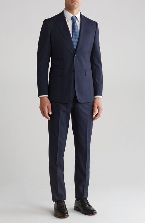 Sophisticated peaked lapels smarten the jacket of this trim-fit suit paired with flat-front trousers and finished in a handsome windowpane plaid print. 36 1/4" inseam; 7 3/4" leg opening; 10 1/2" rise (size 38R) Jacket has peaked lapels; chest welt pocket; front flap pockets Unhemmed Lined 80% polyester, 18% rayon, 2% spandex Dry clean Imported Male Wedding Guest Outfit Formal, Navy Suit Tie, Wedding Guest Outfit Formal, Male Wedding Guest Outfit, Windowpane Plaid, Suits Men, Trim Fit, Navy Suit, Peak Lapel