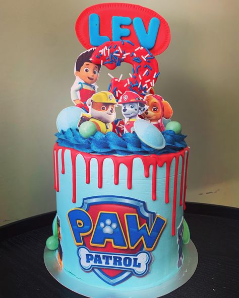 Paw patrol cake. Vanilla biscuit, filled with strawberry jam & swiss meringue buttercream. #pawpatrol #pawpatrolparty #birthdaycakeideas #cakedesign #cakedecoratingideas #cakesofinstagram Paw Patrol Ryder Cake, Paw Patrol Simple Cake, Paw Patrol Drip Cake, Easy Paw Patrol Cake, Paw Patrol Buttercream Cake, Simple Paw Patrol Cake, Paw Patrol Birthday Cake Boys, Paw Patrol Birthday Party Cake, Paw Patrol Party Decorations