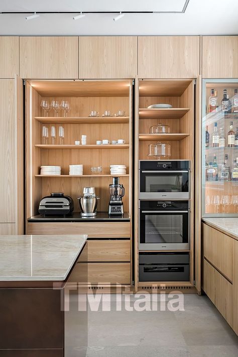 modern kitchen Hidden Wall Oven, Retractable Kitchen Cabinet Doors, Concealed Appliances Kitchen, Retractable Doors Kitchen, Slide And Hide Kitchen Doors, Fridge Unit Kitchen Designs, Pocket Doors Kitchen Cabinets, Hidden Fridge Cabinet, Hidden Kitchen Appliances