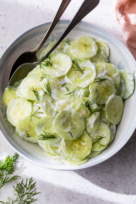 This four-ingredient Creamy Cucumber Salad, made with Greek yogurt and fresh dill, is one of my family's favorite summer side dishes. #salad #sidedish #cucumbers #5ingredientsorless #easyrecipes #lowcarb #vegetarian #glutenfree #healthyrecipes #weightwatcherrecipes Summer Sides Recipes, Watermelon Cucumber Feta Salad, Creamy Cucumber Salad, Creamy Cucumbers, Grape Salad, Side Dishes For Bbq, Cucumber Recipes Salad, Chicken Meals, Cucumber Recipes