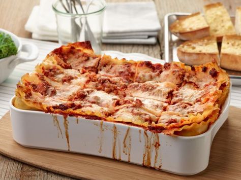 Tyler Florence dubbed this dish the Ultimate Lasagna for good reason: it's built in three generous layers of lasagna noodles, ricotta cheese and savory Bolognese sauce. Ultimate Lasagna Recipe, March Meals, Tyler Florence Recipes, Dinner Party Mains, Holiday Recipies, Complete Meals, Italian Feast, Lasagna Recipes, Dinner Pasta