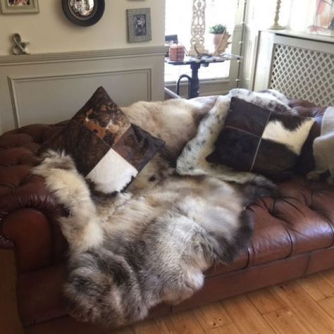 Sheepskins and sofas - the perfect partners Leather Sofa Throws, Sheepskin Rug On Sofa, Brown Leather Sofa Aesthetic, Leather Sofa Aesthetic, Viking Room, Scandi Style Living Room, Brown Chesterfield Sofa, Danish Living Room, Dark Brown Leather Sofa