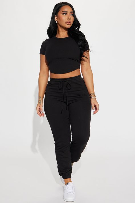 Available In Black And Oatmeal. Jogger Set Short Sleeve Crew Neck Jogger High Waist Elastic Waistband Front Tie Stretch Top: 51% Cotton 41% Polyester 8% Spandex Pants; 51% Cotton 49% Polyester Imported | All In Jogger Set in Black size Small by Fashion Nova Plus Size Streetwear Fashion, Black Joggers Outfit, Plus Size Streetwear, Stephanie Rao, Fashion Nova Outfits, Spandex Pants, Makeup Makeover, Stretch Top, Black Joggers