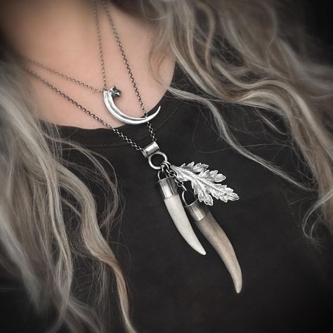 Large double deer antler tips and cast distressed torn leaf sterling silver charm pendant talisman necklace. About 5" in length, truly a statement piece! - https://www.etsy.com/listing/1744113680/ - @etsy @metalsmithsociety #antleraddict #antlers #antlerjewelry #bonejewelry #bonejewellery #organicjewelry #leafjewelry #handmade #handmadejewelry #leaves #antlertips #hornnecklace #clawjunkie #sterlingsilver #gothicjewelry #leafnecklace #castjewelry #charmnecklace #antlernecklace #talismanjewel... Antler Jewelry, Antler Necklace, Talisman Necklace, Bone Jewelry, Organic Jewelry, Horn Necklace, Casting Jewelry, Deer Antler, Leaf Jewelry