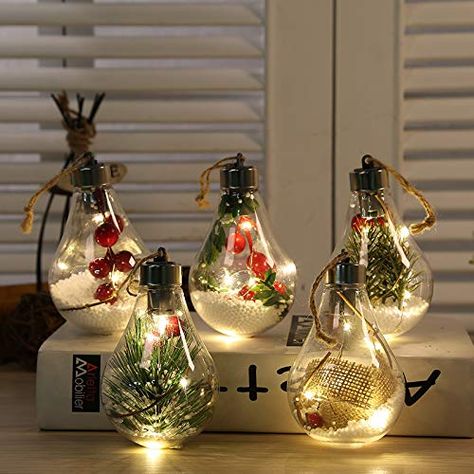 PRICES MAY VARY. Package Included: 5 iridescent Light Bulbs ornaments. Came with no button cell. Each Bulb Needs 3 button batteries (AG13/LR44). Please have batteries ready before you place your order! Premium Material: The Christmas ball lamp is made of transparent plastic, which will not easily break and cause damage when it drops on the ground, very safe. Easy to Use: The light design with flax rope, looks beautiful as decorative lights, garden lights, porch lights and terrace lamps. Convenie Led Ball Lights, Light Bulb Ornaments, Christmas Light Bulbs, Xmas Lights, Led Decor, W Hotel, Led Christmas Lights, Lighted Ornaments, Ball Lights